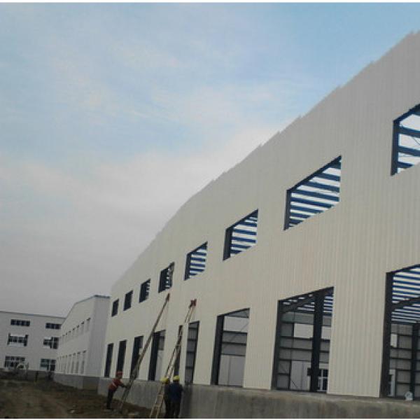 three stores steel structure building manufacturer design steel structure building/three floor structual steel warehouse #1 image