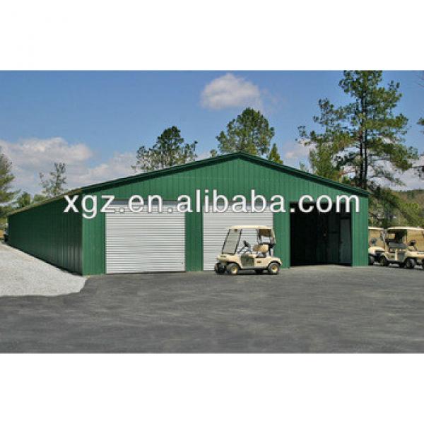 Metal building with agricultural equipment #1 image
